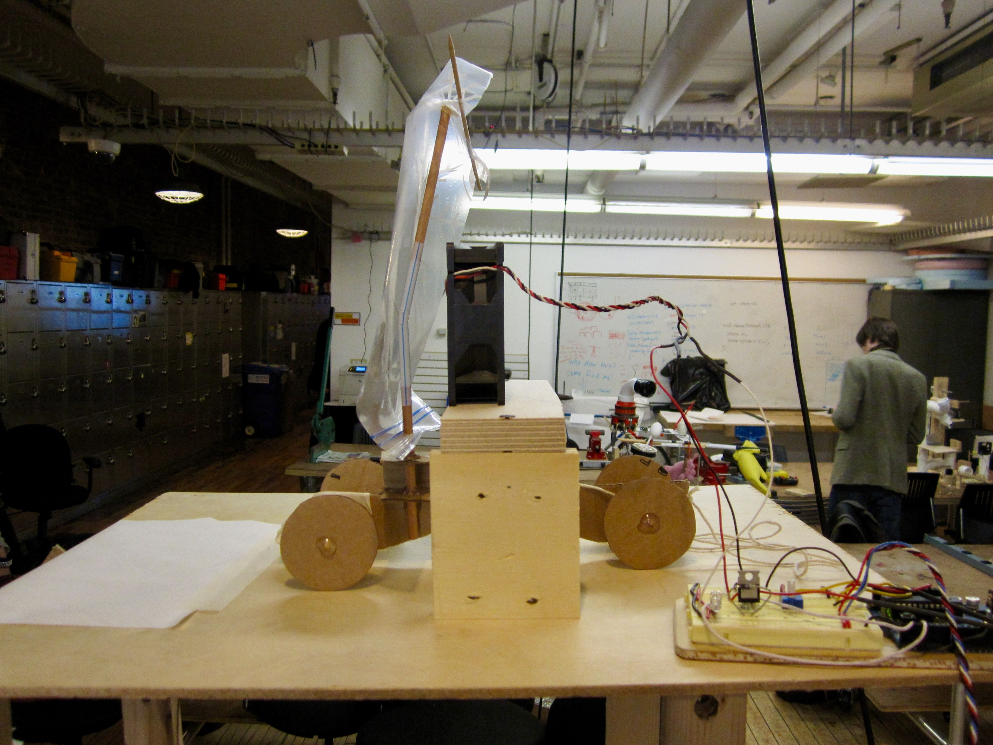 A small fan-propelled sail car