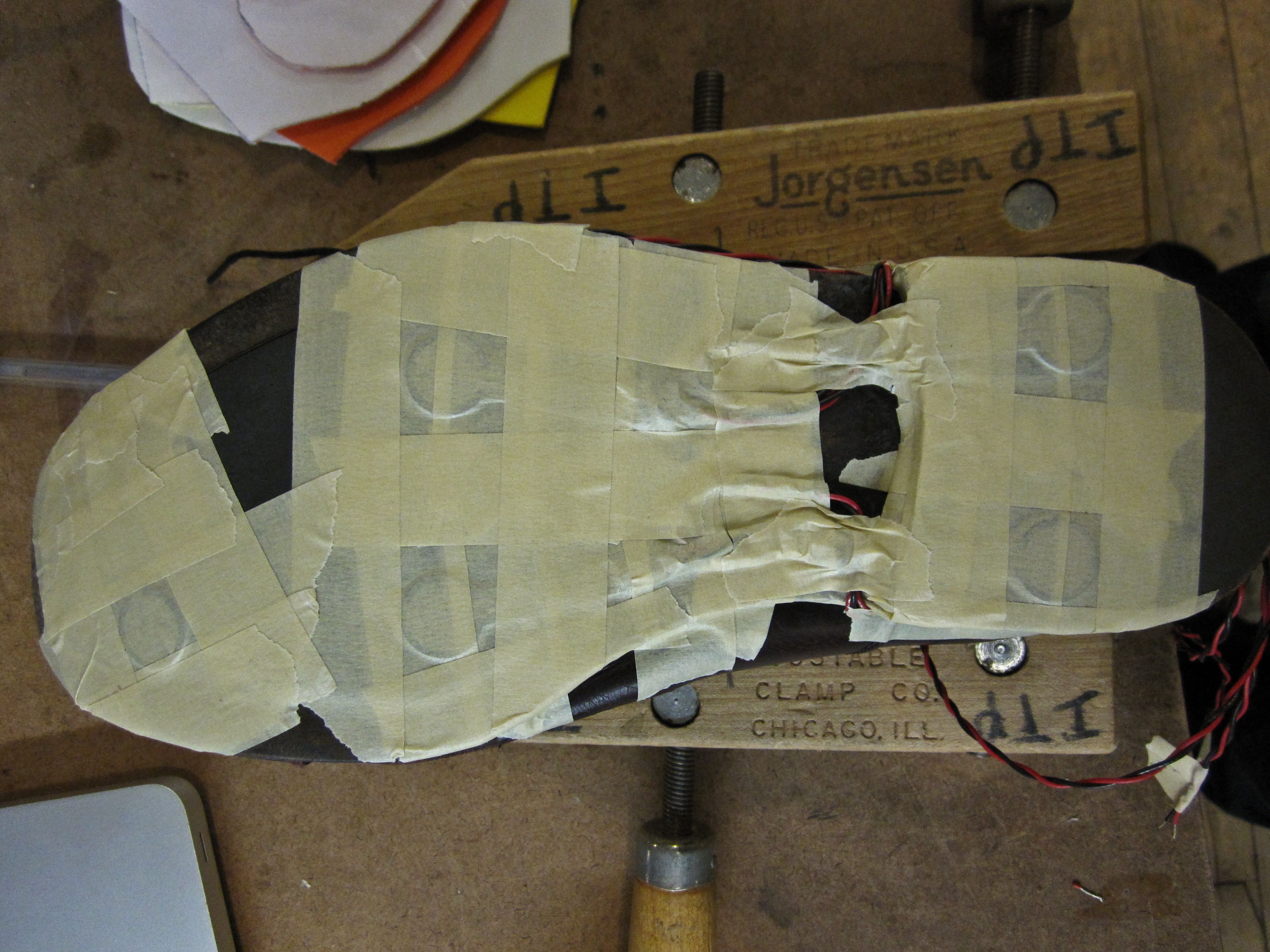 Sensors taped to the bottom of a shoe