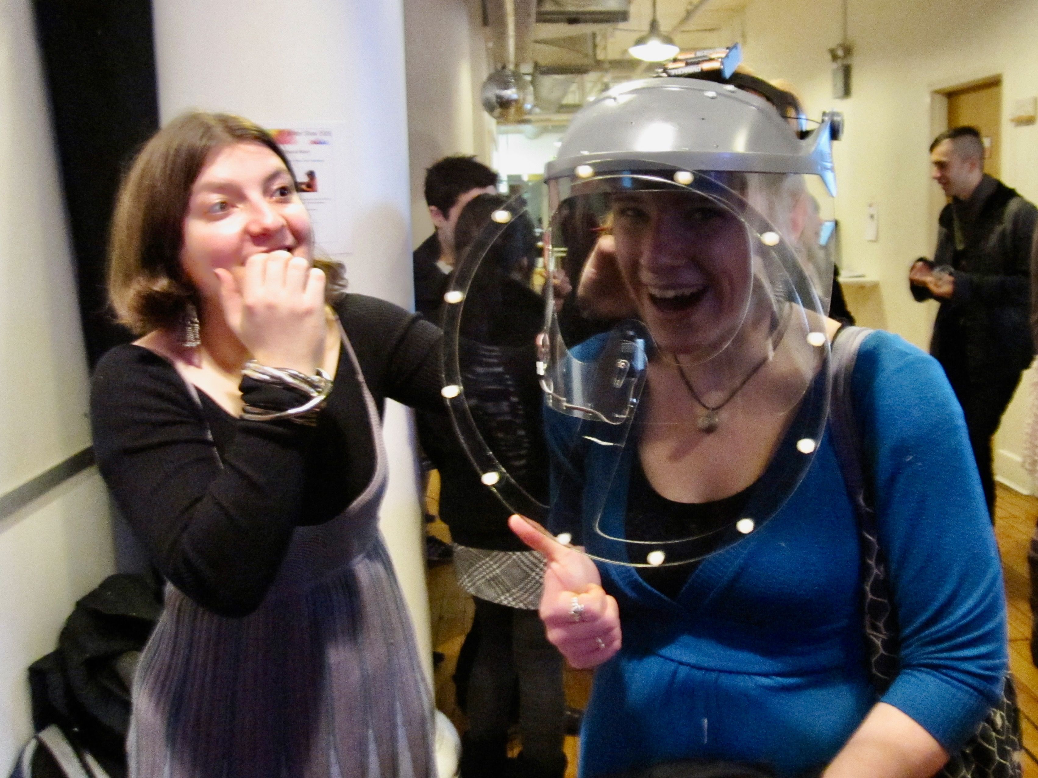 A smiling person wearing a Mental Block headset