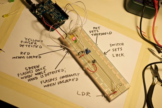 A visually annotated electronics project on a breadboard