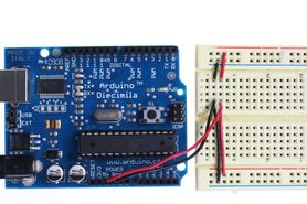An Arduino connected to a breadboard