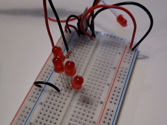 Four LEDs attached to a breadboard